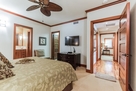 Bedroom #2 w/walk-in closet & en suite bath.