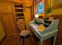 Queen bedroom with desk and closet
