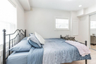 guest bedroom with queen size bed on 1st floo