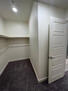 Walk in closet in main suite