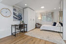 Downstairs bedroom with desk.