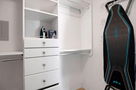 plenty of drawers and space, ironing board/ir