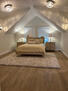 Primary bedroom with queen bed.