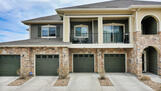 Garage with opener and space in front to park