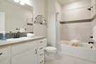Secondary bath with tub/shower combo & modern