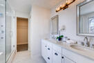 Master bathroom with quartz counters.