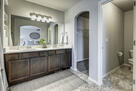 Master bath with large walk-in closet