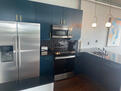 Modern kitchen w stainless appliances