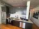 New tiled backsplash in kitchen