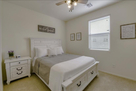 Queen Bed and Ceiling Fan in 2nd Bedroom