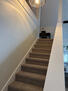 steps to loft primary bedroom