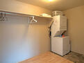 Main bedroom closet and stackable 110