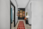 Private hallway leads to spacious primary win