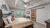 Master bedroom. Barn door to en suite.