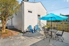Outside patio area with patio table and addit