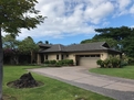 Front yard, driveway & garage.