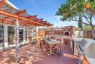outdoor kitchen area with large barbeque