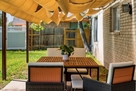 Unwind outdoors with shaded lounge and dining