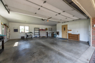 Large Garage with stationary tub and work are