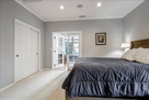 Main guest room showing closets & entry to En