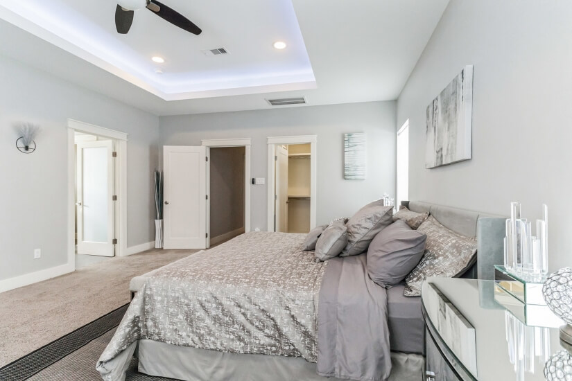 Master bedroom features a coffer ceiling w/LED mood lighting