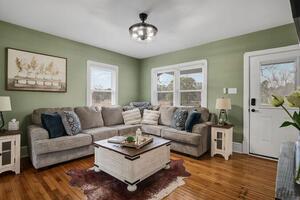 Beautiful Farmhouse on Pond and 40 Acres