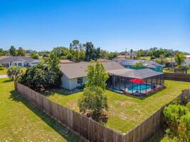 Aerial View of Private Corner-Lot Property