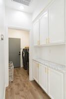 Laundry room, washer, and dryer