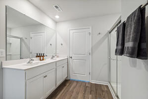 Indulge in luxury with a walk-in shower and double sinks