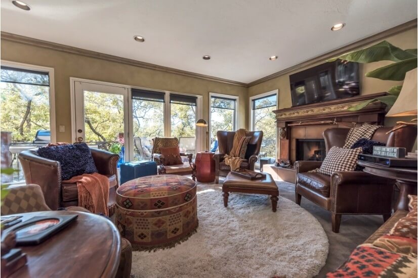 Family room off kitchen w/ flat new TV & adjoining deck