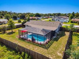 Aerial View of Home, Pool and Fenced Yard