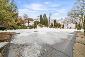 Backyard-Covered In-Ground Pool and Landscaped Surroundings