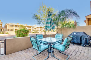 Patio with queen palm tree and mtn views
