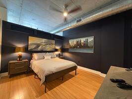 Cozy bedroom, dresser with 55 inch flat screen TV