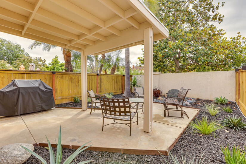 BBQ on backyard covered patio