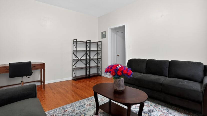 Comfortable Shared Living Room with TV and Natural Light