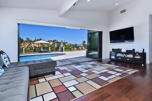 Indoor space opening up to outdoor space