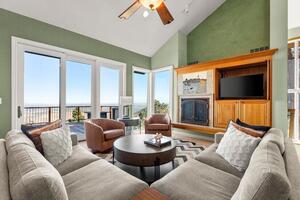 Living room with views and curated furniture.