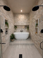 Primary bath with walk-in shower and soaking tub