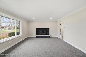 Spacious Living Room with Fireplace
