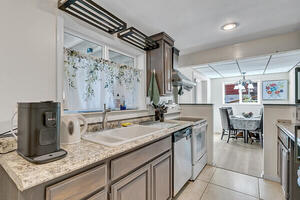 Kitchen East with window to Sunroom