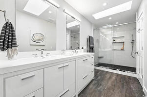 Master Bathroom with walk-in shower and full shower amenitie