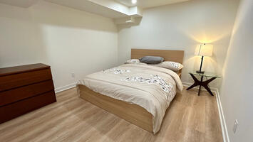 spacious bedrooms with queen bed