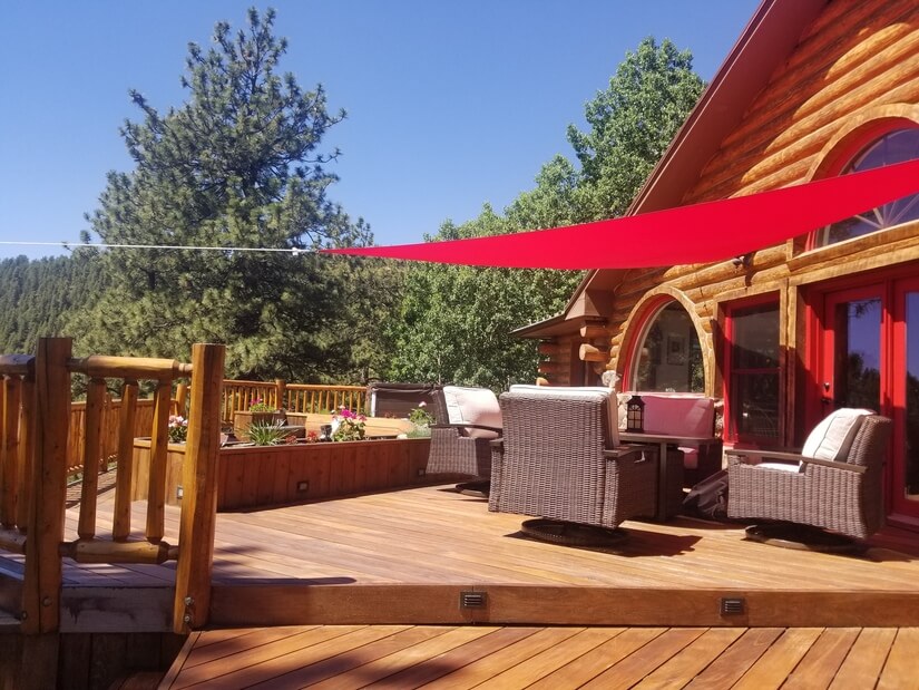 Sunlit deck surrounded by peaceful nature