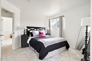Bedroom one with queen size bed