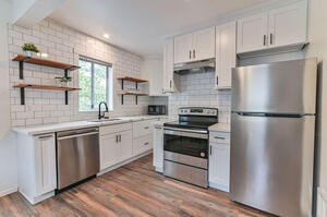 New kitchen with stainless appliances