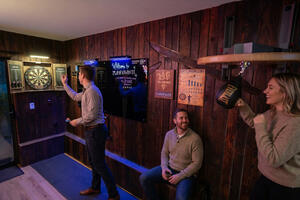 Play darts or have a go at the speed bag.