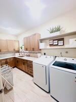 Spacious Laundry Room, Sink & cabinets