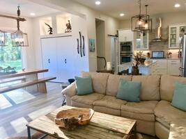 Spacious open living area. Sliding doors to outdoor patio.