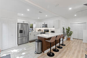 kitchen. Washer & Dryer in left cabinet